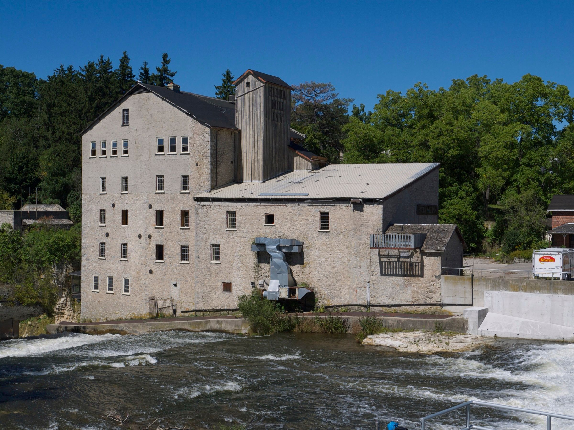 The stone Elora Mill beside the falls of the Grand River